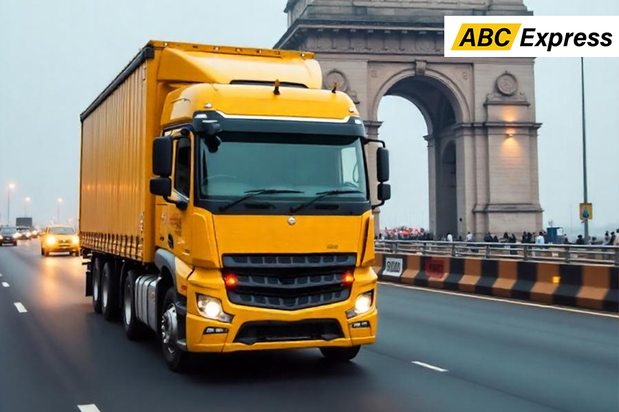yellow transport service truck on mumbai road